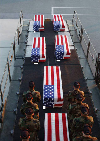 More flag-draped coffins