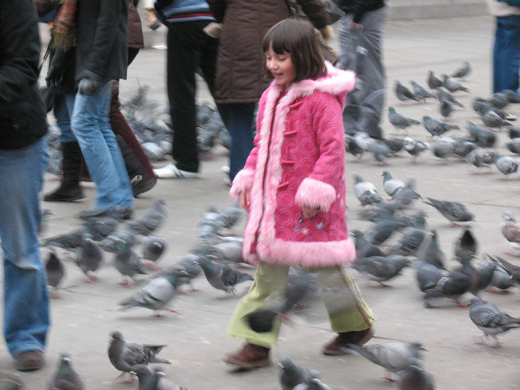 The little girl in the pink coat